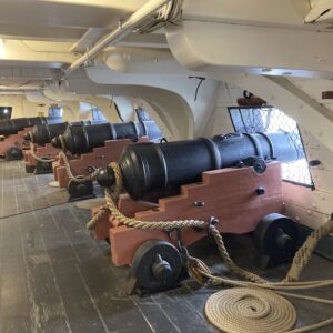 Row of cannon on USS Constitution, a historic ship. Living history is a popular history extracurricular activity.